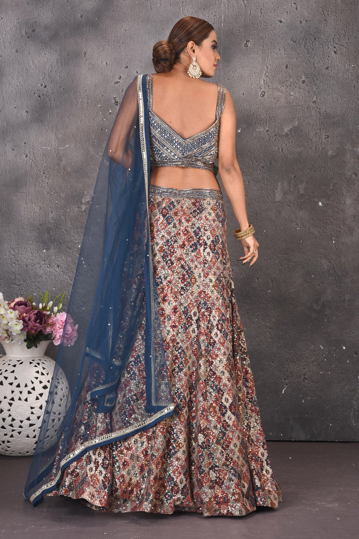 Buy beautiful blue multicolor embroidered designer lehenga online in USA with dupatta. Look stylish at parties and wedding festivities in designer dresses, Indowestern outfits, Anarkali suits, wedding lehengas, palazzo suits, sharara suits from Pure Elegance Indian clothing store in USA.-back