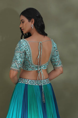 Shop stunning sea green and blue belted designer lehenga online in USA. Look your best at weddings and parties in Indian dresses, designer lehengas, Anarkali suits, designer gowns, salwar suits, sharara suits from Pure Elegance Indian fashion store in USA.-back