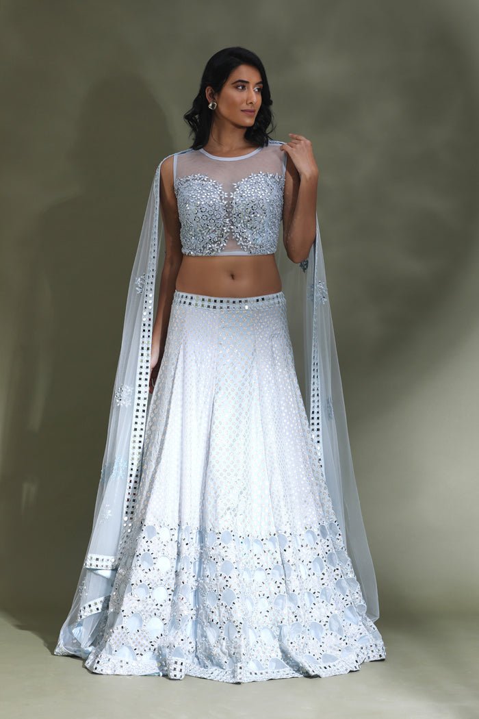 Buy beautiful powder blue embroidered lehenga online in USA with dupatta. Look your best at weddings and parties in Indian dresses, designer lehengas, Anarkali suits, designer gowns, salwar suits, sharara suits from Pure Elegance Indian fashion store in USA.-front