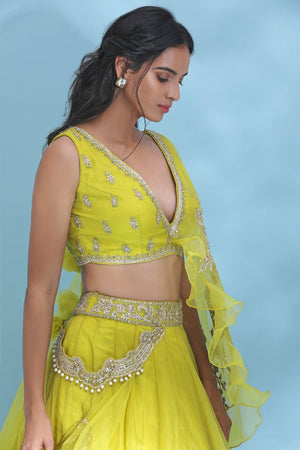 Buy stunning bright yellow embroidered designer lehenga online in USA with dupatta. Look your best at weddings and parties in Indian dresses, designer lehengas, Anarkali suits, designer gowns, salwar suits, sharara suits from Pure Elegance Indian fashion store in USA.-closeup