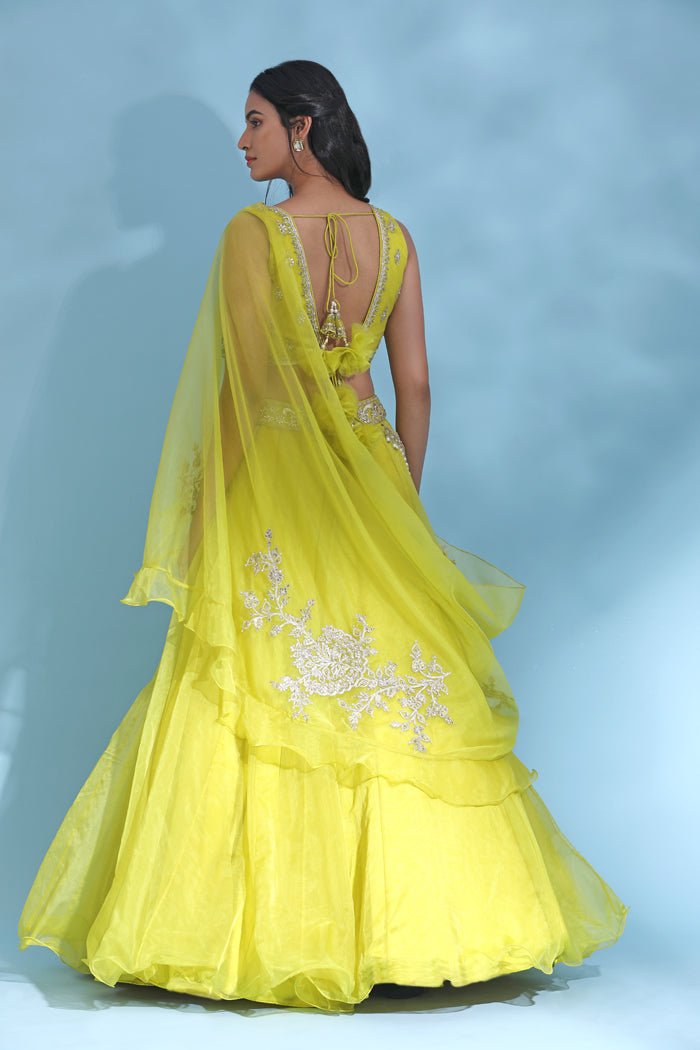 Buy stunning bright yellow embroidered designer lehenga online in USA with dupatta. Look your best at weddings and parties in Indian dresses, designer lehengas, Anarkali suits, designer gowns, salwar suits, sharara suits from Pure Elegance Indian fashion store in USA.- blouse back