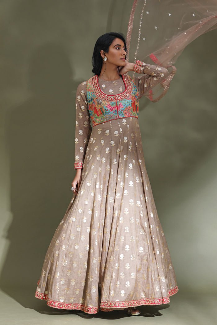 Buy stunning beige Anarkali suit online in USA with embroidered multicolor jacket. Look your best at weddings and parties in Indian dresses, designer lehengas, Anarkali suits, designer gowns, salwar suits, sharara suits from Pure Elegance Indian fashion store in USA.-front