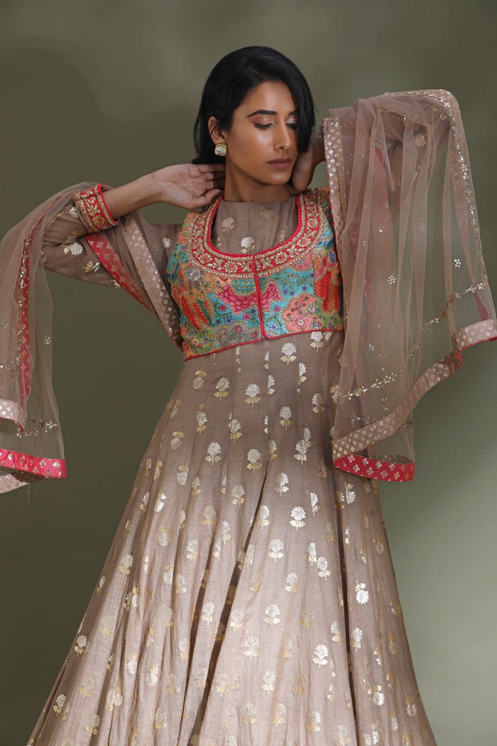Buy stunning beige Anarkali suit online in USA with embroidered multicolor jacket. Look your best at weddings and parties in Indian dresses, designer lehengas, Anarkali suits, designer gowns, salwar suits, sharara suits from Pure Elegance Indian fashion store in USA.-closeup