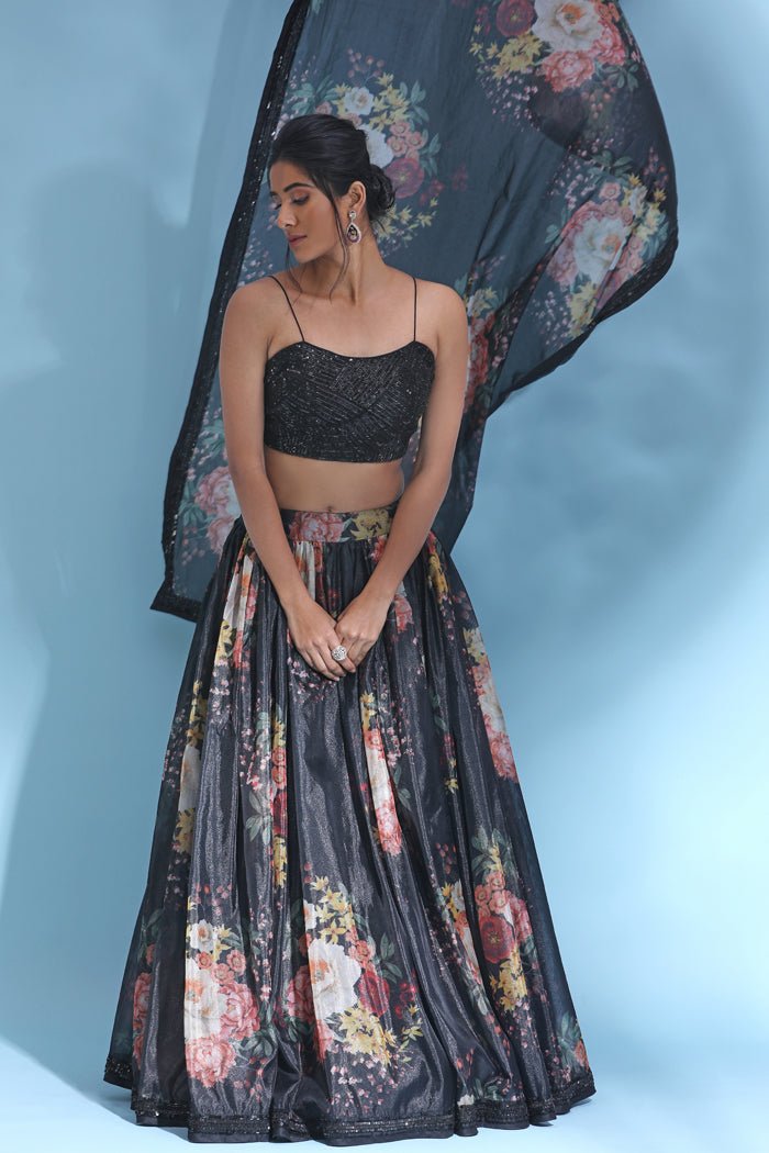Buy stunning black floral lehenga online in USA with sequin blouse and dupatta. Look your best at weddings and parties in Indian dresses, designer lehengas, Anarkali suits, designer gowns, salwar suits, sharara suits from Pure Elegance Indian fashion store in USA.-full view