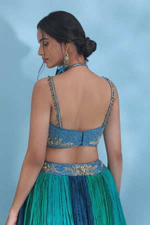 Shop stunning blue and green designer lehenga online in USA with dupatta. Look your best at weddings and parties in Indian dresses, designer lehengas, Anarkali suits, designer gowns, salwar suits, sharara suits from Pure Elegance Indian fashion store in USA.-back
