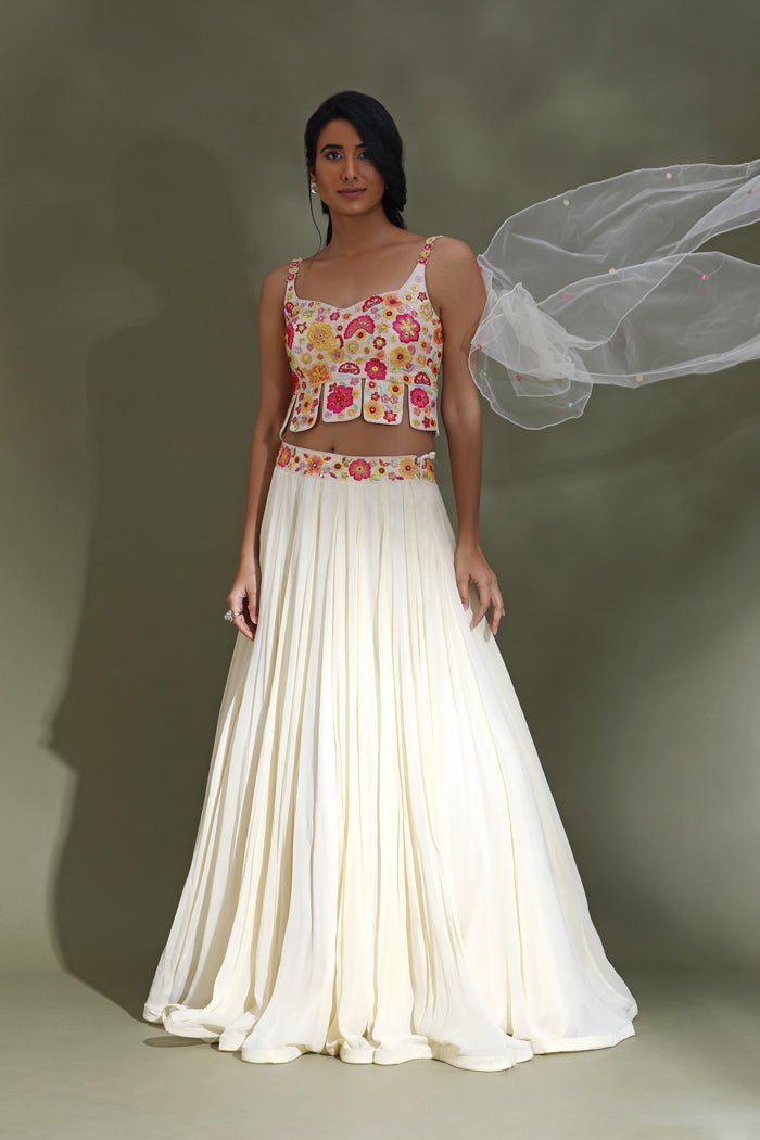 Buy stunning off-white lehenga online in USA with multicolor embroidery blouse. Look your best at weddings and parties in Indian dresses, designer lehengas, Anarkali suits, designer gowns, salwar suits, sharara suits from Pure Elegance Indian fashion store in USA.-full view