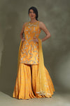Buy stunning yellow embroidered gharara suit online in USA with dupatta. Look your best at weddings and parties in Indian dresses, designer lehengas, Anarkali suits, designer gowns, salwar suits, sharara suits from Pure Elegance Indian fashion store in USA.-full view