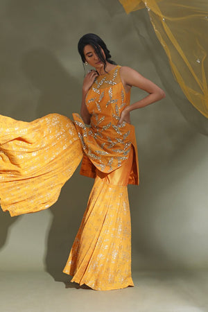 Buy stunning yellow embroidered gharara suit online in USA with dupatta. Look your best at weddings and parties in Indian dresses, designer lehengas, Anarkali suits, designer gowns, salwar suits, sharara suits from Pure Elegance Indian fashion store in USA.-gharara