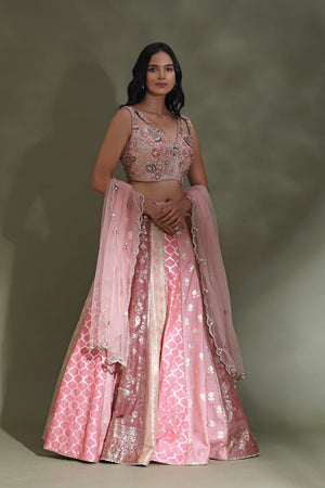 Buy beautiful pink embroidered contemporary designer lehenga online in USA with dupatta. Look your best at weddings and parties in Indian dresses, designer lehengas, Anarkali suits, designer gowns, salwar suits, sharara suits from Pure Elegance Indian fashion store in USA.-side