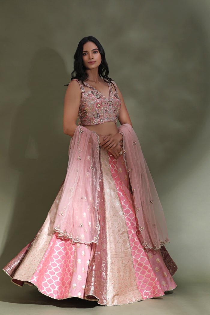 Buy beautiful pink embroidered contemporary designer lehenga online in USA with dupatta. Look your best at weddings and parties in Indian dresses, designer lehengas, Anarkali suits, designer gowns, salwar suits, sharara suits from Pure Elegance Indian fashion store in USA.-skirt