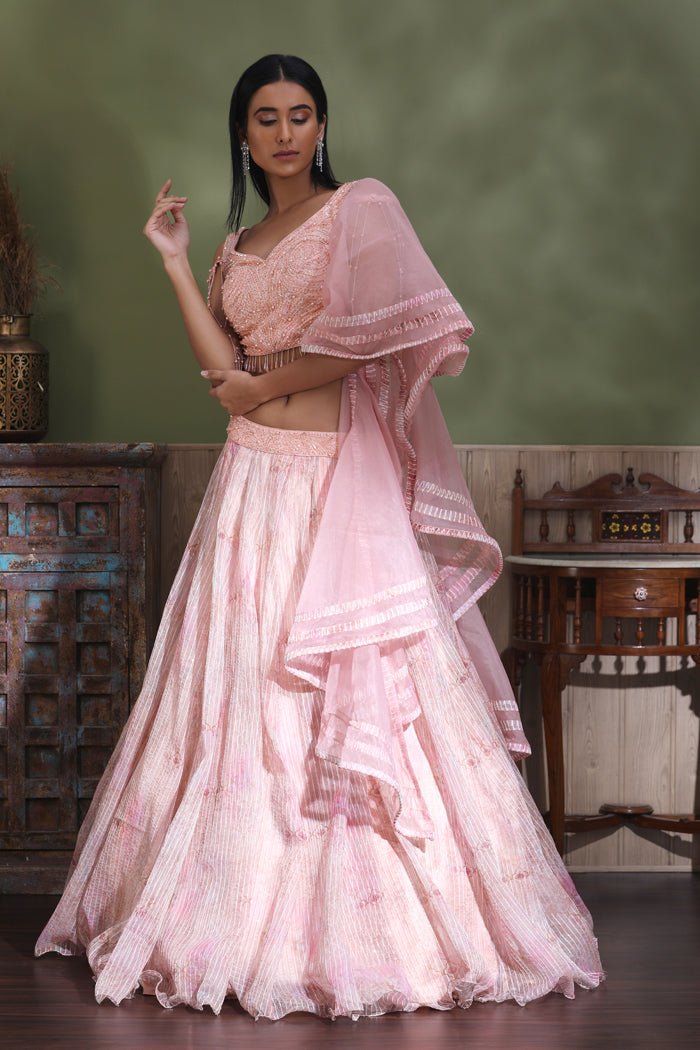 Shop powder pink contemporary lehenga online in USA with dupatta. Look your best at weddings and parties in Indian dresses, designer lehengas, Anarkali suits, designer gowns, salwar suits, sharara suits from Pure Elegance Indian fashion store in USA.-dupatta