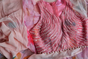 Shop beautiful light pink printed ruffle saree online in USA with pearl work blouse. Look your best at weddings and parties in Indian sarees, designer saris, printed sarees, embroidered sarees from Pure Elegance Indian fashion store in USA.-details
