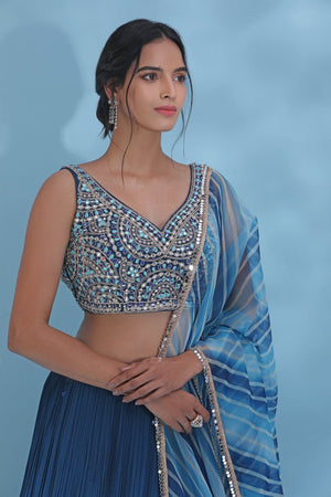 Shop powder pink contemporary lehenga online in USA with dupatta. Look your best at weddings and parties in Indian dresses, designer lehengas, Anarkali suits, designer gowns, salwar suits, sharara suits from Pure Elegance Indian fashion store in USA.-closeup