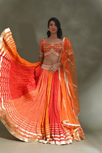 Shop beautiful orange and red lehenga online in USA with gota border and dupatta. Look your best at weddings and parties in Indian dresses, designer lehengas, Anarkali suits, designer gowns, salwar suits, sharara suits from Pure Elegance Indian fashion store in USA.-full view