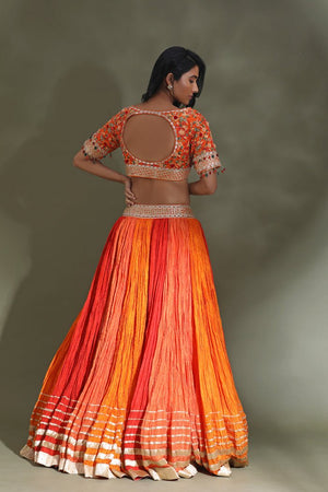 Shop beautiful orange and red lehenga online in USA with gota border and dupatta. Look your best at weddings and parties in Indian dresses, designer lehengas, Anarkali suits, designer gowns, salwar suits, sharara suits from Pure Elegance Indian fashion store in USA.-back