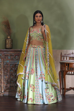 Shop stunning pastel green embroidered lehenga online in USA with yellow dupatta. Look your best at weddings and parties in Indian dresses, designer lehengas, Anarkali suits, designer gowns, salwar suits, sharara suits from Pure Elegance Indian fashion store in USA.-side
