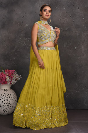 Shop beautiful pista green mirror work lehenga online in USA with dupatta. Look your best at weddings and special occasions in exclusive designer lehengas, Anarkali suits, sharara suits. designer gowns and Indian dresses from Pure Elegance Indian fashion store in USA.-right