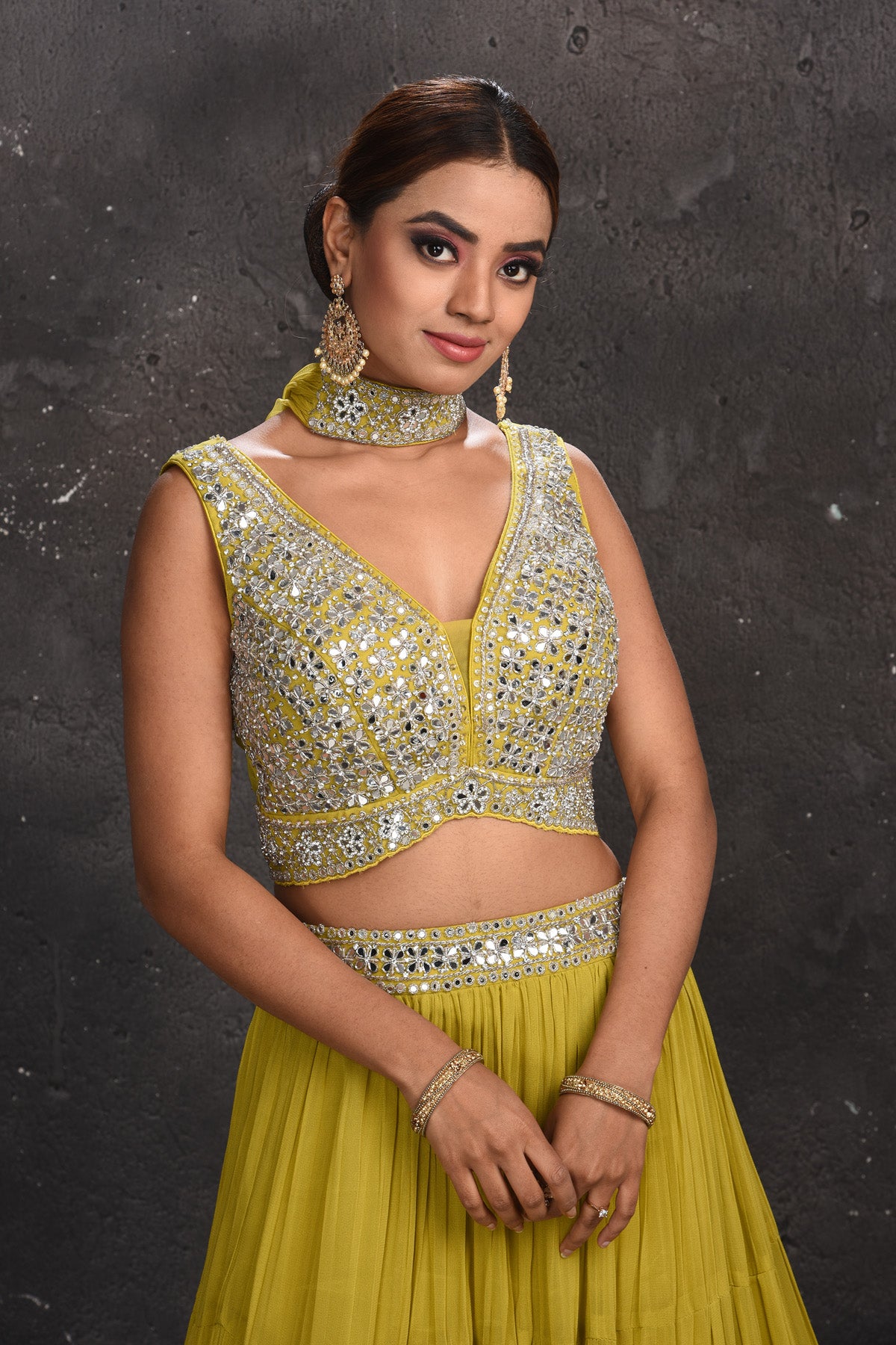 Shop beautiful pista green mirror work lehenga online in USA with dupatta. Look your best at weddings and special occasions in exclusive designer lehengas, Anarkali suits, sharara suits. designer gowns and Indian dresses from Pure Elegance Indian fashion store in USA.-closeup