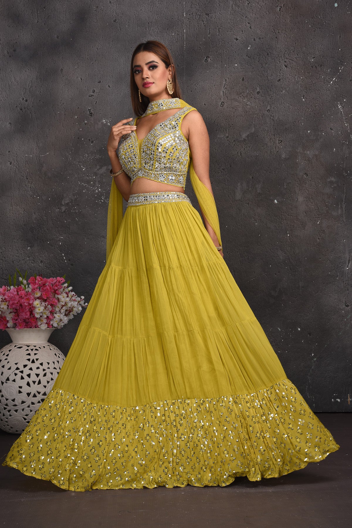 Shop stunning green mirror work lehenga online in USA with dupatta. Look your best at weddings and special occasions in exclusive designer lehengas, Anarkali suits, sharara suits. designer gowns and Indian dresses from Pure Elegance Indian fashion store in USA.-side