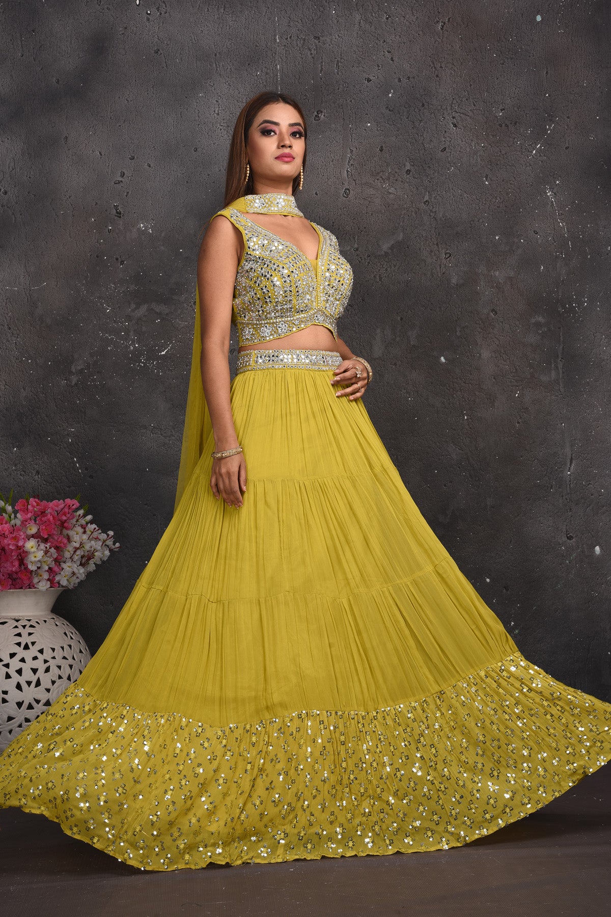 Shop stunning green mirror work lehenga online in USA with dupatta. Look your best at weddings and special occasions in exclusive designer lehengas, Anarkali suits, sharara suits. designer gowns and Indian dresses from Pure Elegance Indian fashion store in USA.-skirt