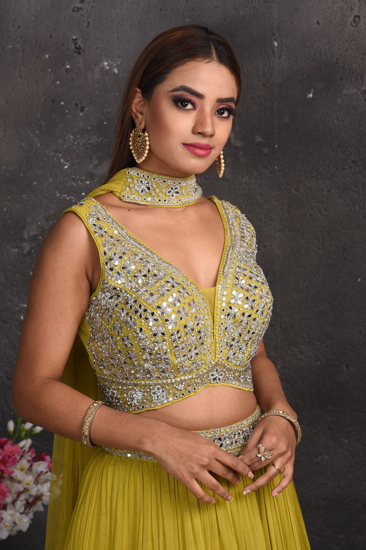 Shop stunning green mirror work lehenga online in USA with dupatta. Look your best at weddings and special occasions in exclusive designer lehengas, Anarkali suits, sharara suits. designer gowns and Indian dresses from Pure Elegance Indian fashion store in USA.-closeup