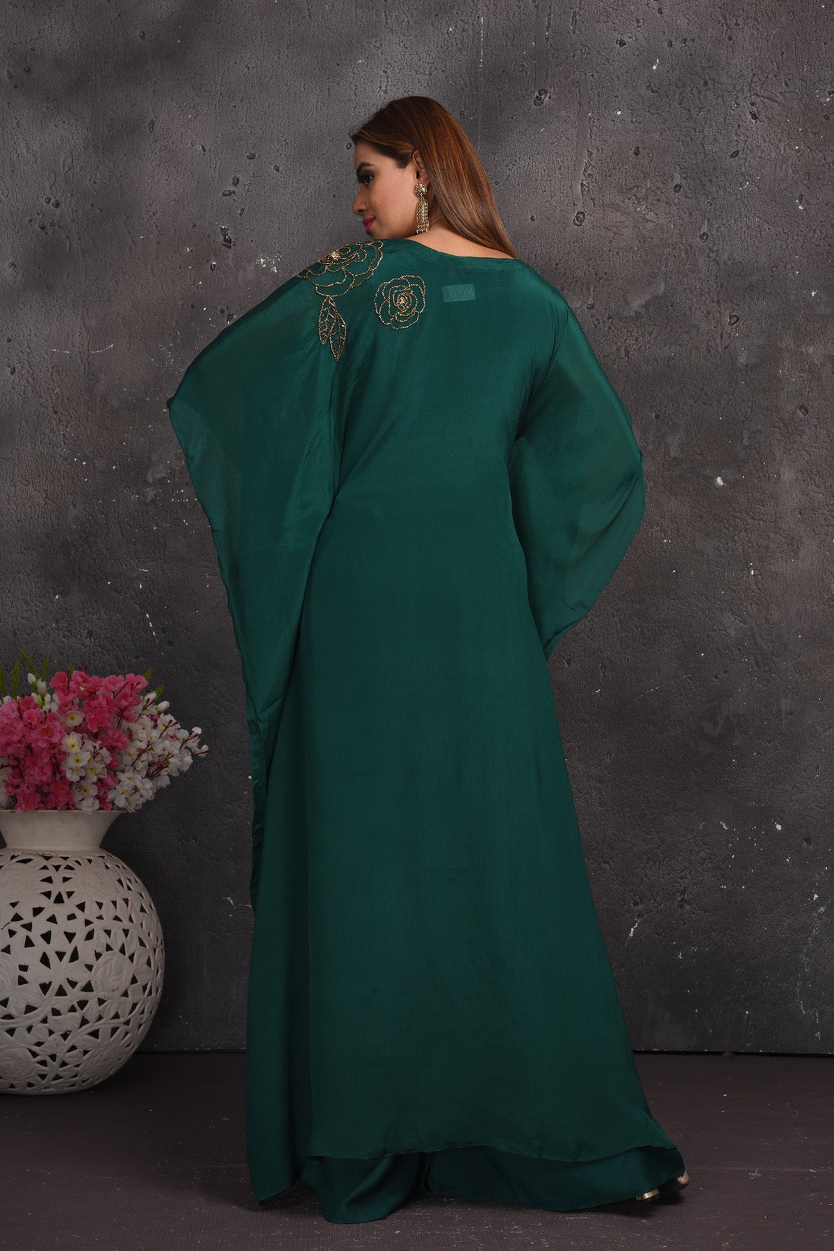 Shop stunning dark green kaftaan gown online in USA. Look your best at weddings and special occasions in exclusive designer lehengas, Anarkali suits, sharara suits. designer gowns and Indian dresses from Pure Elegance Indian fashion store in USA.-back