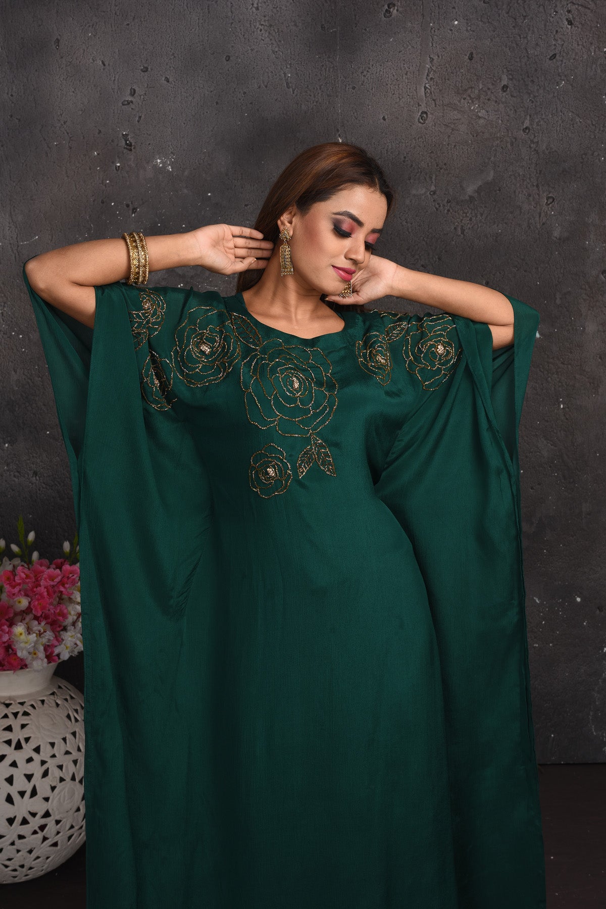 Shop stunning dark green kaftaan gown online in USA. Look your best at weddings and special occasions in exclusive designer lehengas, Anarkali suits, sharara suits. designer gowns and Indian dresses from Pure Elegance Indian fashion store in USA.-closeup