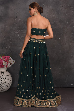 Shop beautiful dark green embroidered palazzo crop top online in USA with longline shrug. Look your best at weddings and special occasions in exclusive designer lehengas, Anarkali suits, sharara suits. designer gowns and Indian dresses from Pure Elegance Indian fashion store in USA.-back