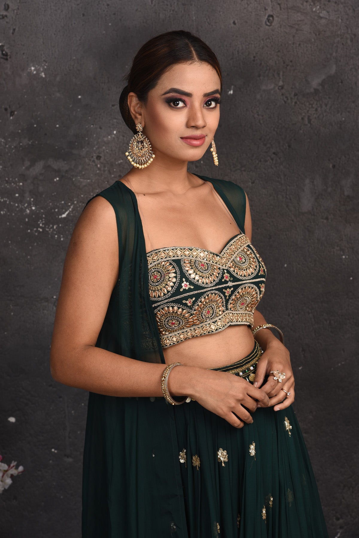 Shop beautiful dark green embroidered palazzo crop top online in USA with longline shrug. Look your best at weddings and special occasions in exclusive designer lehengas, Anarkali suits, sharara suits. designer gowns and Indian dresses from Pure Elegance Indian fashion store in USA.-closeup