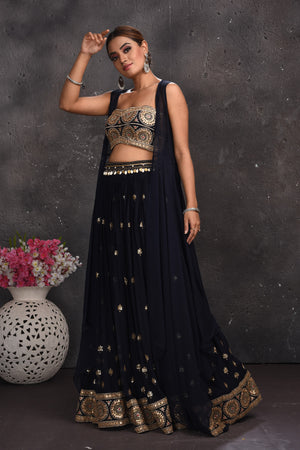 Buy stunning navy blue embroidered palazzo crop top online in USA with longline shrug. Look your best at weddings and special occasions in exclusive designer lehengas, Anarkali suits, sharara suits. designer gowns and Indian dresses from Pure Elegance Indian fashion store in USA.-side