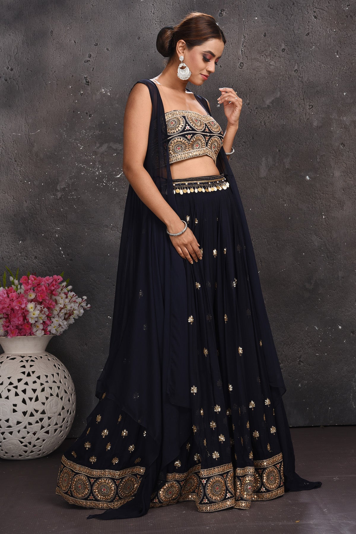 Buy stunning navy blue embroidered palazzo crop top online in USA with longline shrug. Look your best at weddings and special occasions in exclusive designer lehengas, Anarkali suits, sharara suits. designer gowns and Indian dresses from Pure Elegance Indian fashion store in USA.-right
