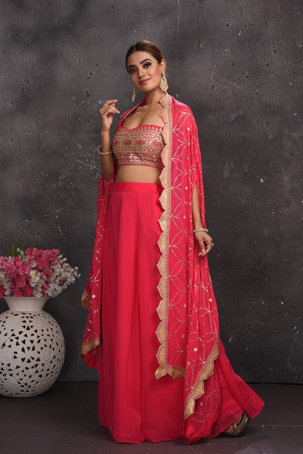 Shop beautiful pink embroidered palazzo crop top online in USA with longline shrug. Look your best at weddings and special occasions in exclusive designer lehengas, Anarkali suits, sharara suits. designer gowns and Indian dresses from Pure Elegance Indian fashion store in USA.-side