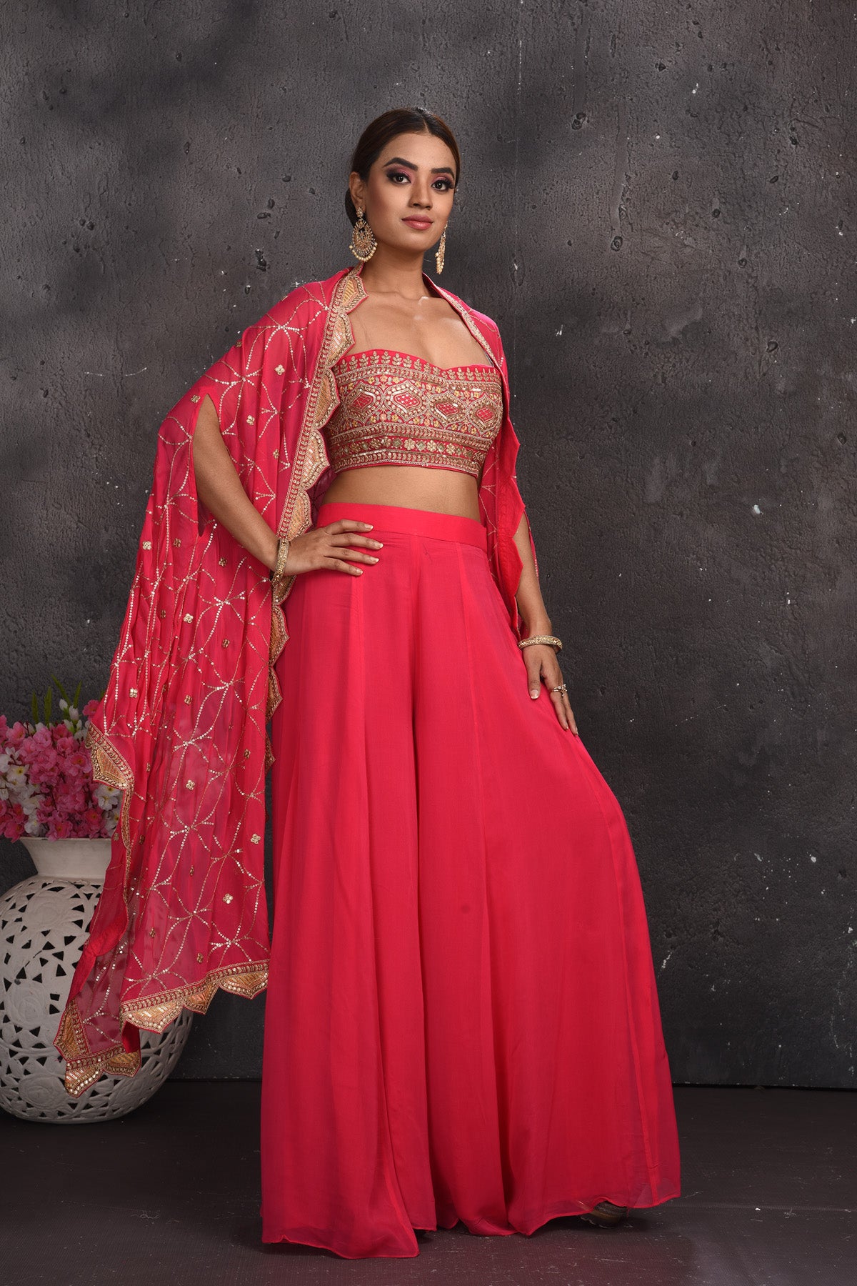 Shop beautiful pink embroidered palazzo crop top online in USA with longline shrug. Look your best at weddings and special occasions in exclusive designer lehengas, Anarkali suits, sharara suits. designer gowns and Indian dresses from Pure Elegance Indian fashion store in USA.-full view