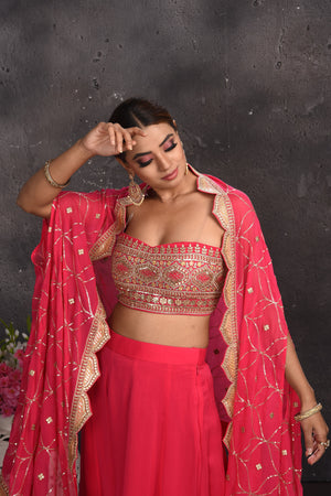 Shop beautiful pink embroidered palazzo crop top online in USA with longline shrug. Look your best at weddings and special occasions in exclusive designer lehengas, Anarkali suits, sharara suits. designer gowns and Indian dresses from Pure Elegance Indian fashion store in USA.-closeup