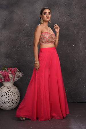 Shop beautiful pink embroidered palazzo crop top online in USA with longline shrug. Look your best at weddings and special occasions in exclusive designer lehengas, Anarkali suits, sharara suits. designer gowns and Indian dresses from Pure Elegance Indian fashion store in USA.-right