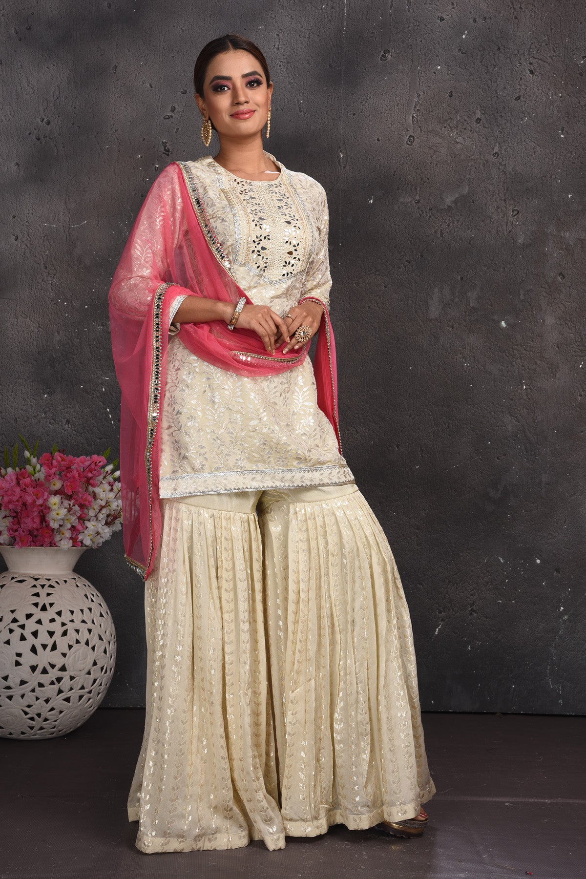 Shop beautiful off-white embroidered gharara suit online in USA with pink dupatta. Look your best at weddings and special occasions in exclusive designer lehengas, Anarkali suits, sharara suits. designer gowns and Indian dresses from Pure Elegance Indian fashion store in USA.-dupatta