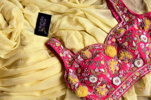 Buy beautiful lemon yellow embroidered georgette saree online in USA with pink embroidered blouse. Look your best at weddings and parties in Indian sarees, designer saris, printed sarees, embroidered sarees from Pure Elegance Indian fashion store in USA.-details