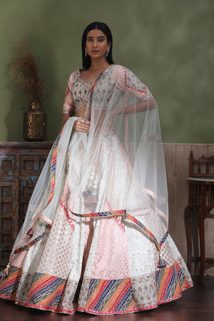 Buy beautiful white embroidered lehenga online in USA with multicolor border and dupatta. Look your best at weddings and parties in Indian dresses, designer lehengas, Anarkali suits, designer gowns, salwar suits, sharara suits from Pure Elegance Indian fashion store in USA.-dupatta