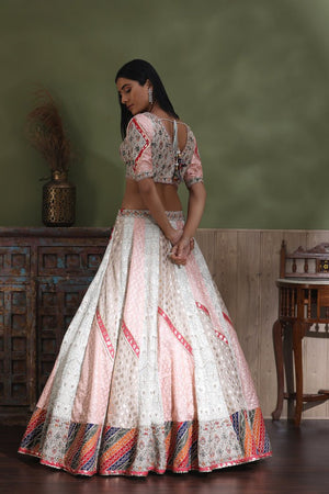 Buy beautiful white embroidered lehenga online in USA with multicolor border and dupatta. Look your best at weddings and parties in Indian dresses, designer lehengas, Anarkali suits, designer gowns, salwar suits, sharara suits from Pure Elegance Indian fashion store in USA.-back