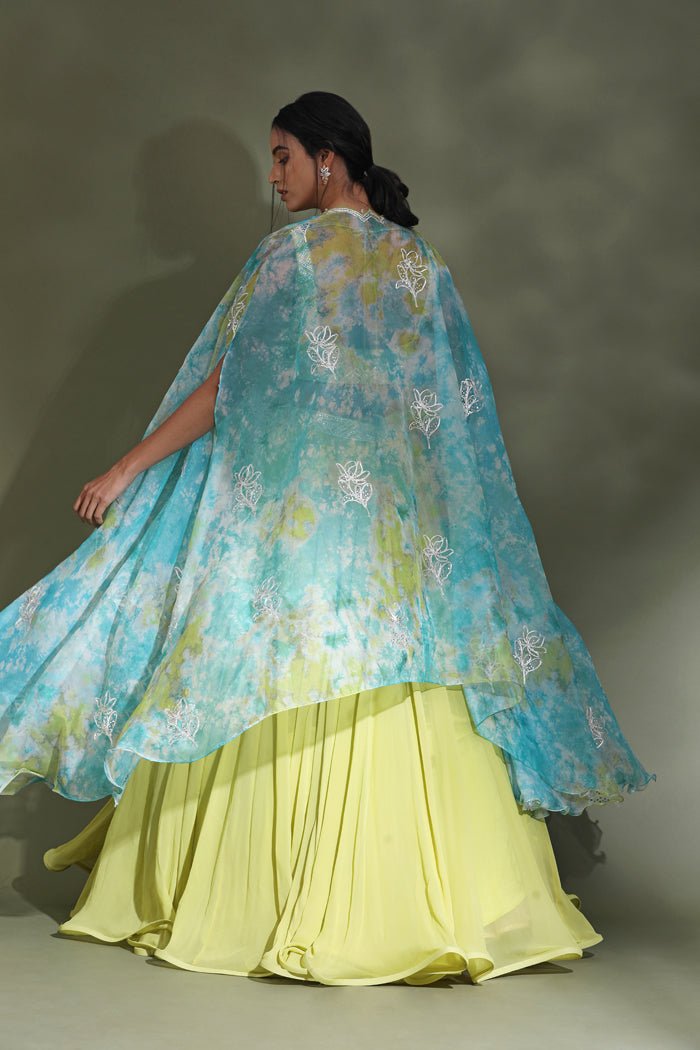 Shop beautiful bright yellow designer lehenga online in USA with blue dupatta. Look your best at weddings and parties in Indian dresses, designer lehengas, Anarkali suits, designer gowns, salwar suits, sharara suits from Pure Elegance Indian fashion store in USA.-back