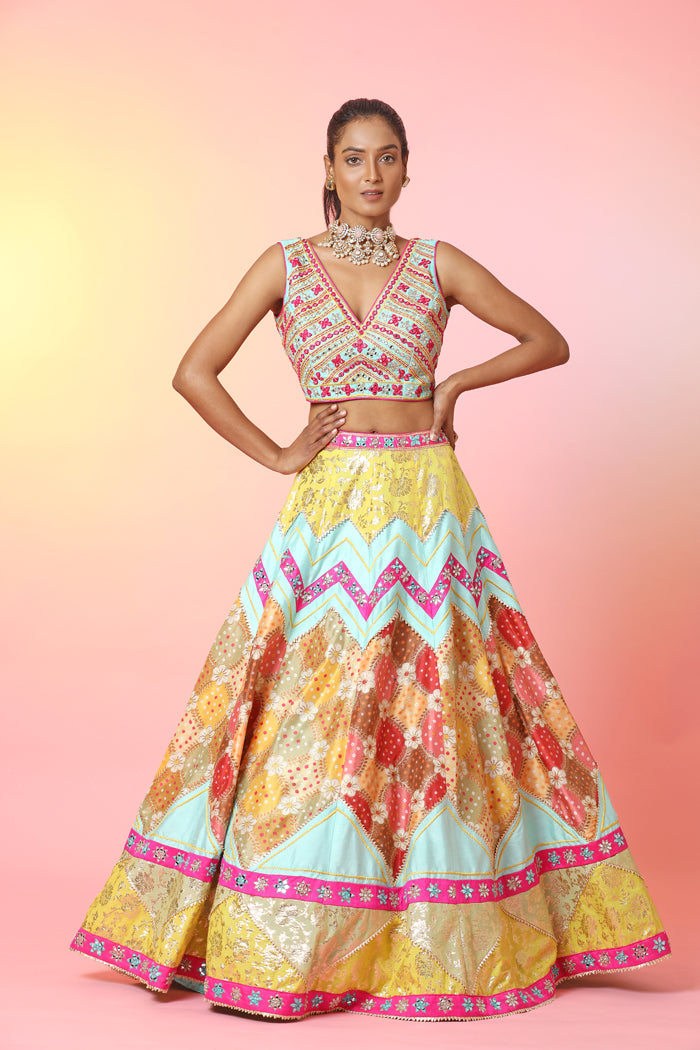 Shop stunning multicolor mirror work lehenga online in USA with dupatta. Look your best at weddings and parties in Indian dresses, designer lehengas, Anarkali suits, designer gowns, salwar suits, sharara suits, embroidered sarees, designer sarees from Pure Elegance Indian fashion store in USA.-front