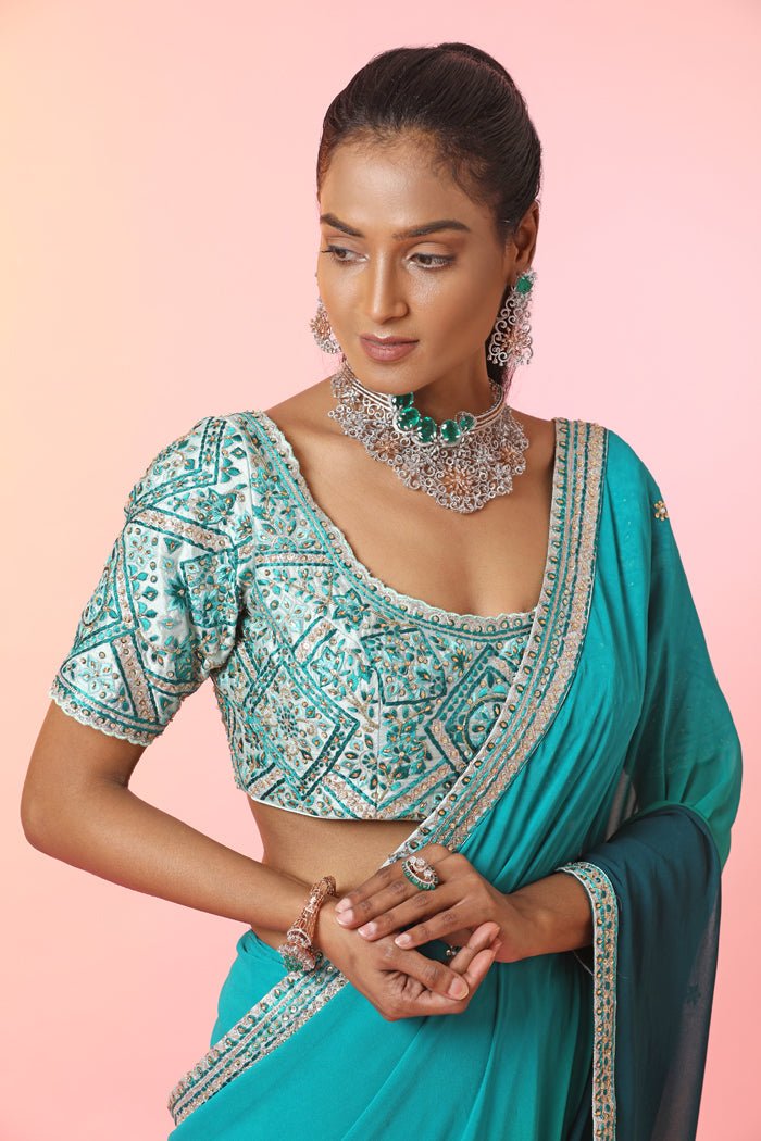 Shop beautiful ombre green designer saree online in USA with embroidered blouse. Look your best at weddings and parties in Indian dresses, designer lehengas, Anarkali suits, designer gowns, salwar suits, sharara suits, embroidered sarees, designer sarees from Pure Elegance Indian fashion store in USA.-closeup