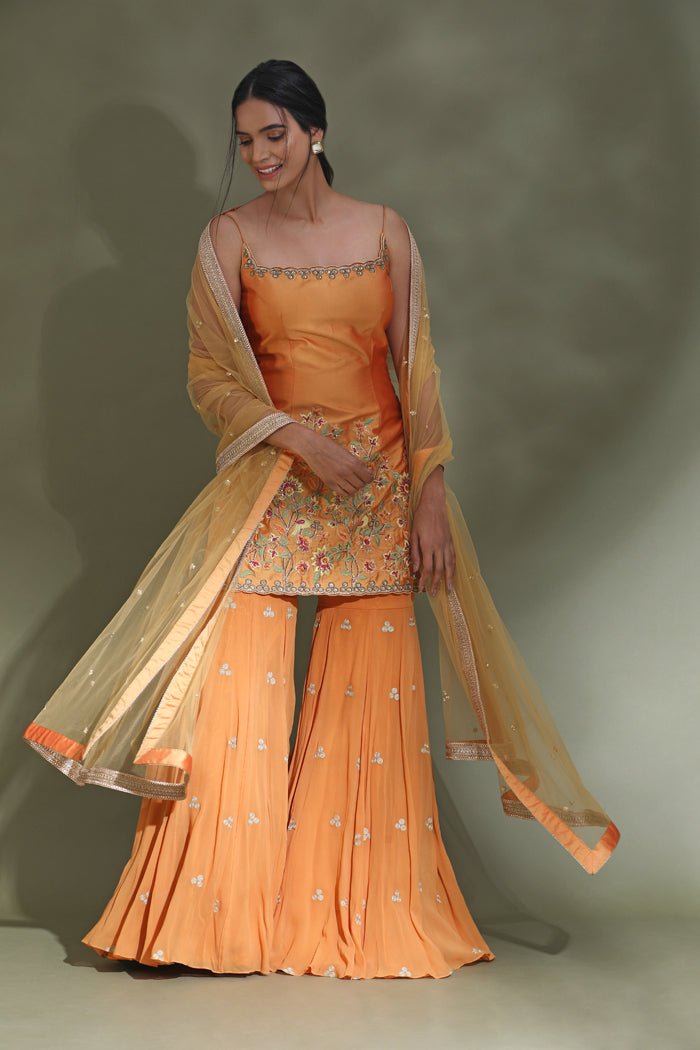 orange sharara dress Orange rust heavy handwork sleeveless sharara suit