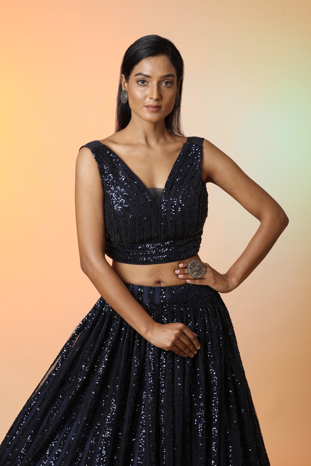 Buy midnight blue embellished designer lehenga online in USA with dupatta. Radiate glamor on special occasions in exquisite designer lehengas, Anarkali suits, wedding gowns, partywear saris, Bollywood sarees, fancy sarees from from Pure Elegance Indian saree store in USA.-closeup
