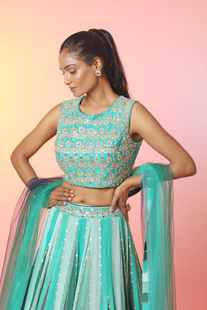 Shop beautiful green stripes embroidered lehenga online in USA with dupatta. Look your best at weddings and parties in Indian dresses, designer lehengas, Anarkali suits, designer gowns, salwar suits, sharara suits, embroidered sarees, designer sarees from Pure Elegance Indian fashion store in USA.-blouse