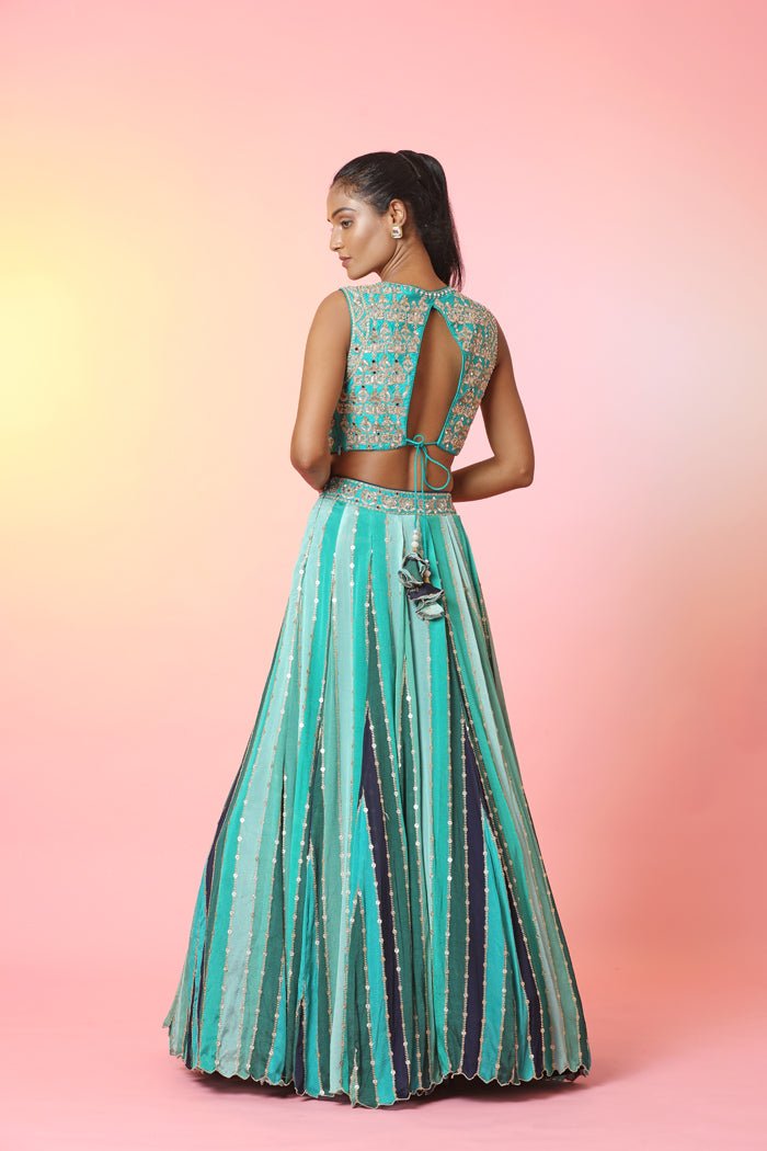 Shop beautiful green stripes embroidered lehenga online in USA with dupatta. Look your best at weddings and parties in Indian dresses, designer lehengas, Anarkali suits, designer gowns, salwar suits, sharara suits, embroidered sarees, designer sarees from Pure Elegance Indian fashion store in USA.-back