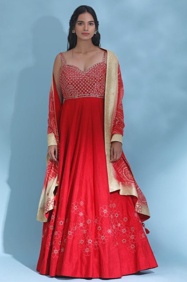 Shop red embroidered floorlength Anarkali online in USA with dupatta. Look your best at weddings and parties in Indian dresses, designer lehengas, Anarkali suits, designer gowns, salwar suits, sharara suits from Pure Elegance Indian fashion store in USA.-full view