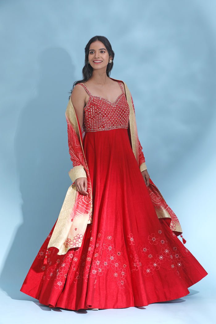 Shop red embroidered floorlength Anarkali online in USA with dupatta. Look your best at weddings and parties in Indian dresses, designer lehengas, Anarkali suits, designer gowns, salwar suits, sharara suits from Pure Elegance Indian fashion store in USA.-side