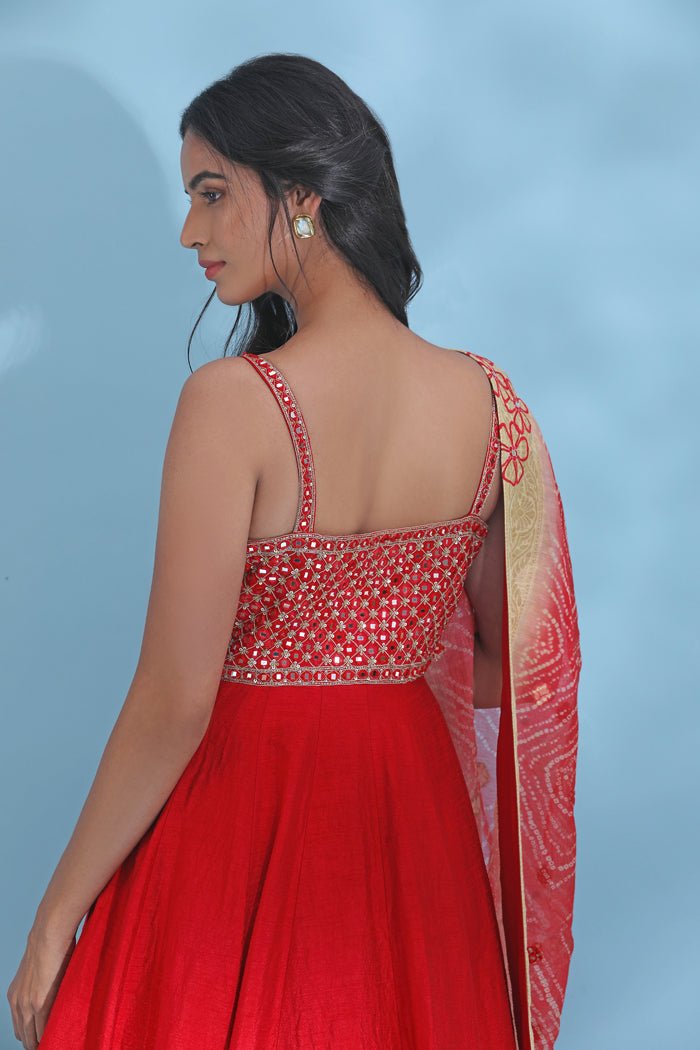 Shop red embroidered floorlength Anarkali online in USA with dupatta. Look your best at weddings and parties in Indian dresses, designer lehengas, Anarkali suits, designer gowns, salwar suits, sharara suits from Pure Elegance Indian fashion store in USA.-back