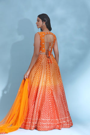 Shop stunning orange mirror work Anarkali online in USA with dupatta. Look your best at weddings and parties in Indian dresses, designer lehengas, Anarkali suits, designer gowns, salwar suits, sharara suits from Pure Elegance Indian fashion store in USA.-back